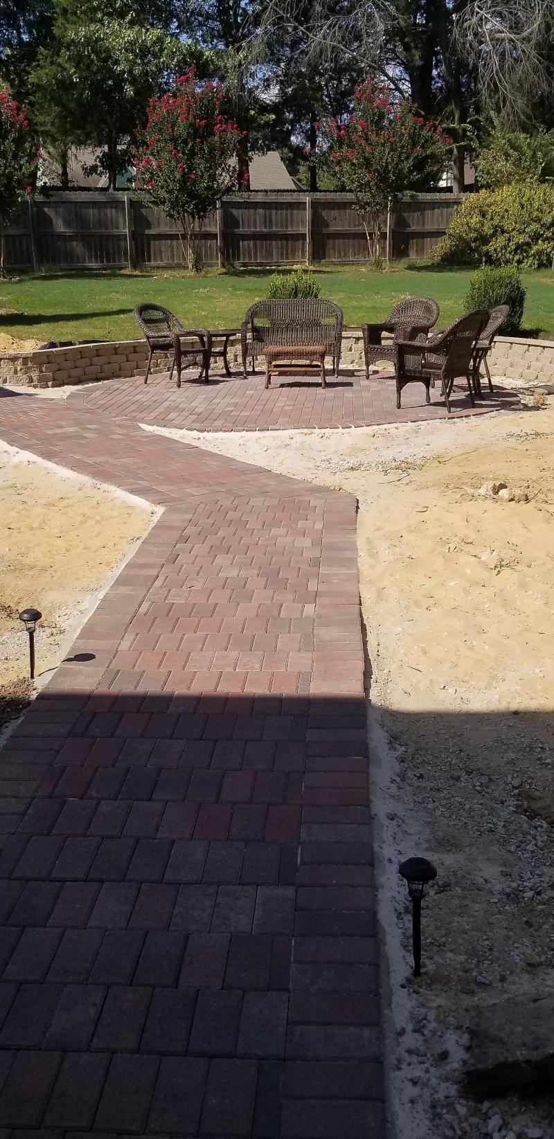 Engineered stone retaining wall built by Robinson Inc
